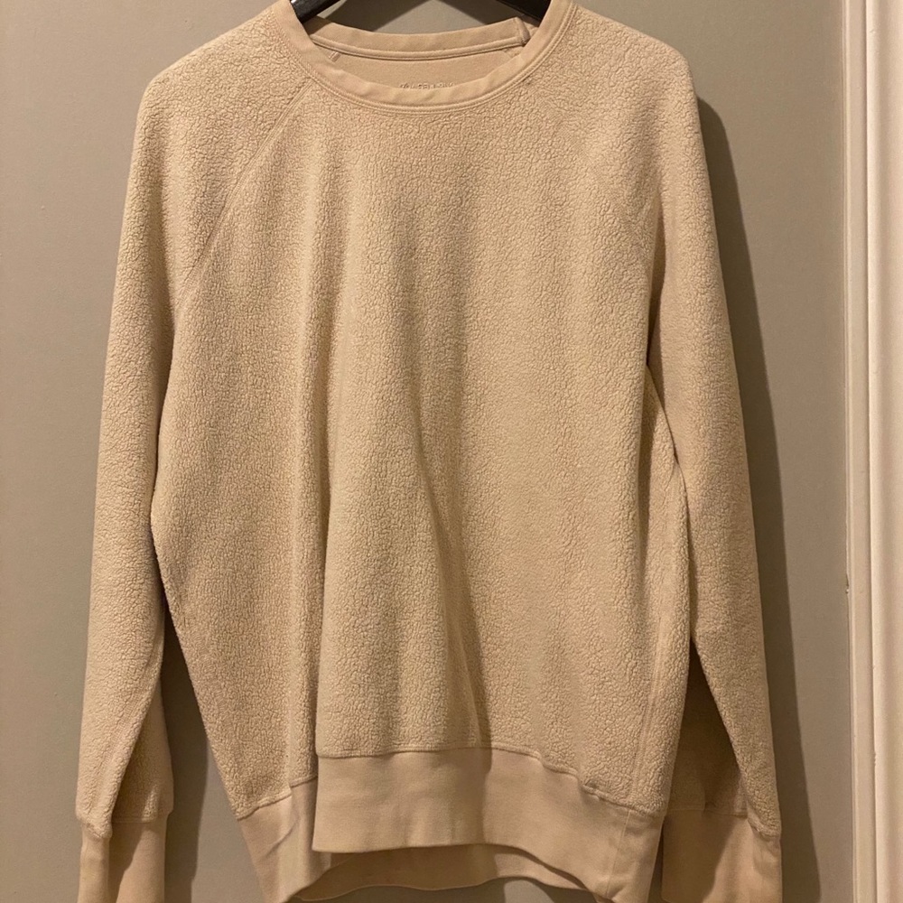 Our legacy reversible crew neck sweater